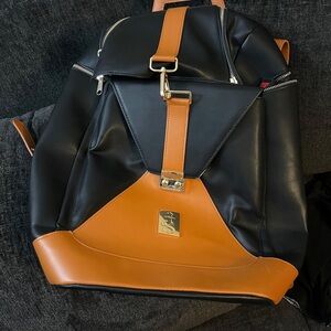 Elegant Black and Tan Men's Backpack